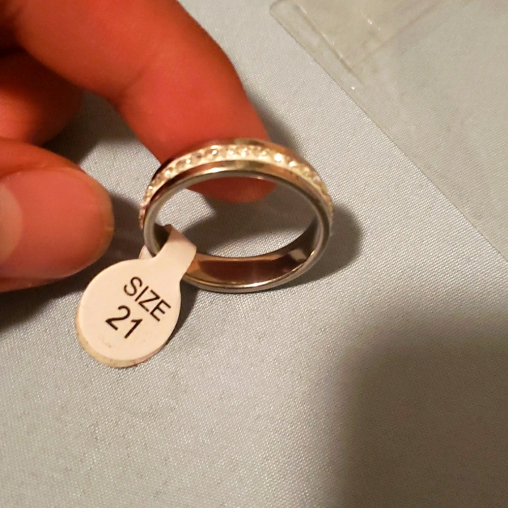 Women luxury ring with diamonds all around it.